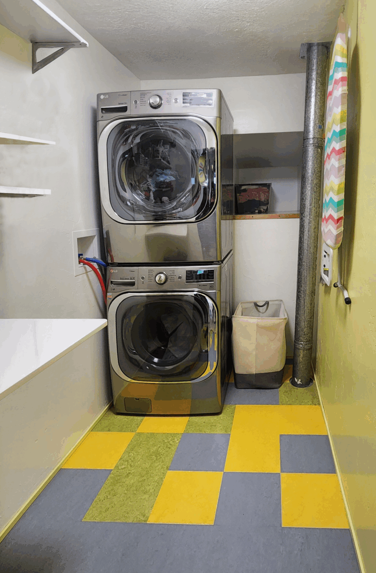 2023 Laundry room remodel, large cubby added to read, made space to stack washer and dryer, updated hookups and installed simple shelve