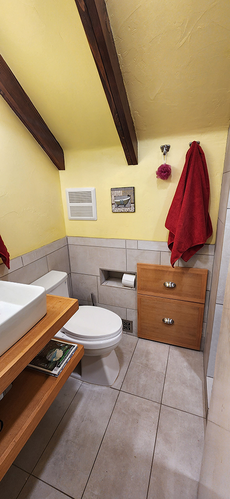 Bathroom under the stairs, custom made vanity, shower enclosure, tp nich, and extra deep cabinet. Bathroom under the stairs, custom made vanity, shower enclosure, tp nich, and extra deep cabinet.